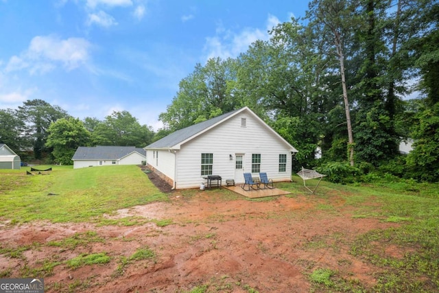 1672 Meadow Lark Ln, Gainesville, GA 30501 - back of property featuring a yard and view of wooded area