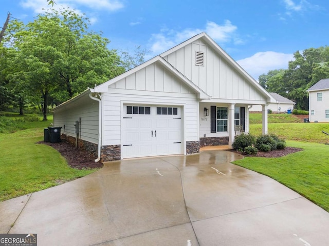 1672 Meadow Lark Ln, Gainesville, GA 30501 - view of front of house featuring board and batten siding, an attached garage, a front yard, driveway, and stone siding