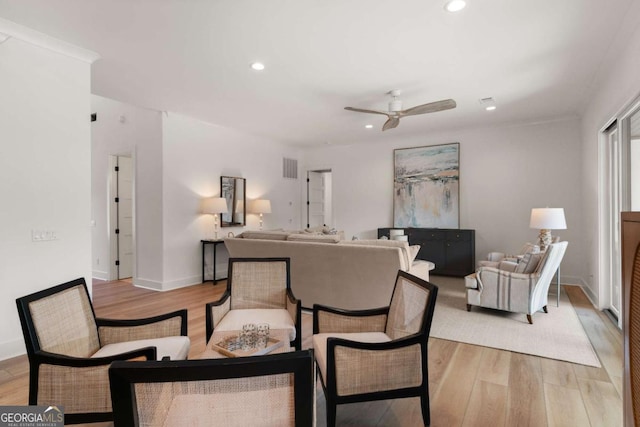 616 Neptune Way, Saint Simons, GA 31522 - living room with light wood finished floors, recessed lighting, and ceiling fan