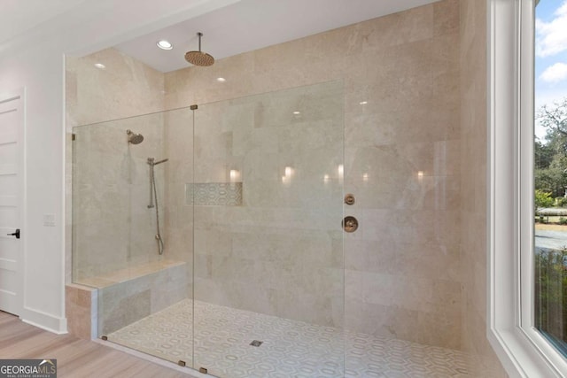 616 Neptune Way, Saint Simons, GA 31522 - full bath with tiled shower, wood finished floors, and recessed lighting