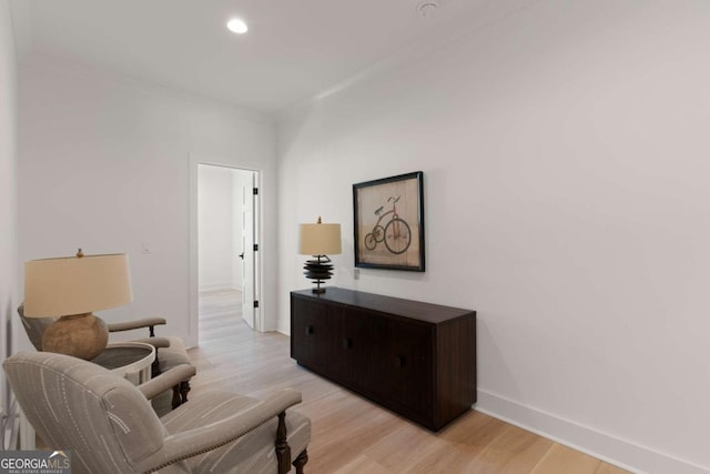 616 Neptune Way, Saint Simons, GA 31522 - sitting room featuring light wood-style flooring and recessed lighting