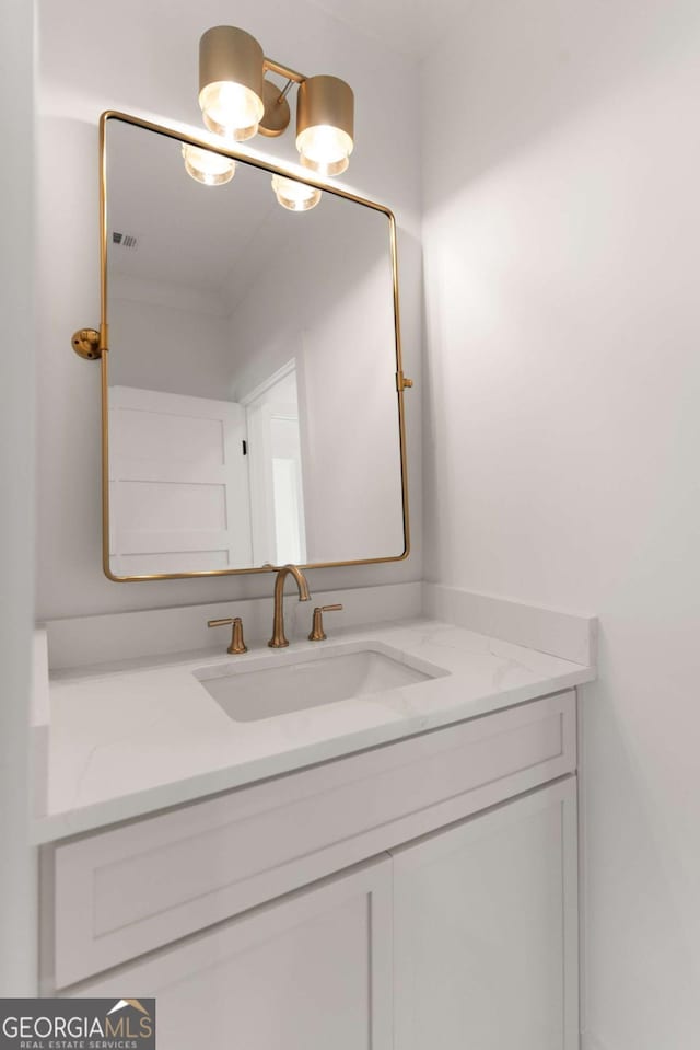616 Neptune Way, Saint Simons, GA 31522 - bathroom featuring vanity