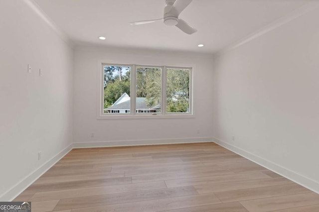 616 Neptune Way, Saint Simons, GA 31522 - spare room with ceiling fan, light wood-style flooring, recessed lighting, and crown molding