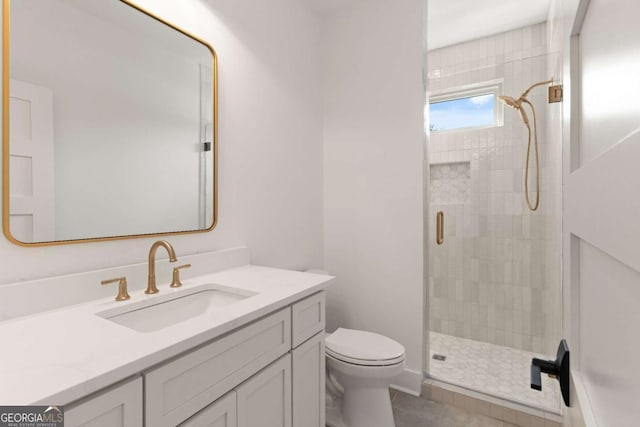 616 Neptune Way, Saint Simons, GA 31522 - bathroom with a shower stall, vanity, and tile patterned flooring