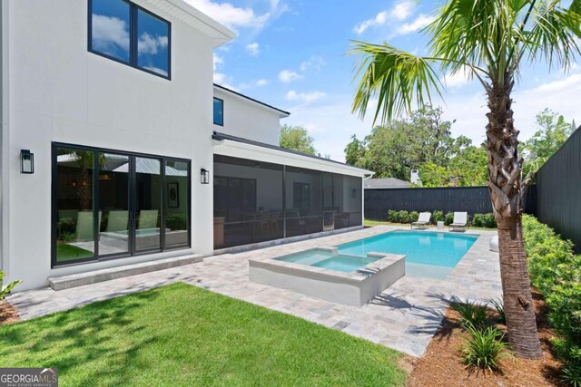 616 Neptune Way, Saint Simons, GA 31522 - view of pool featuring an in-ground hot tub, a fenced backyard, and a patio