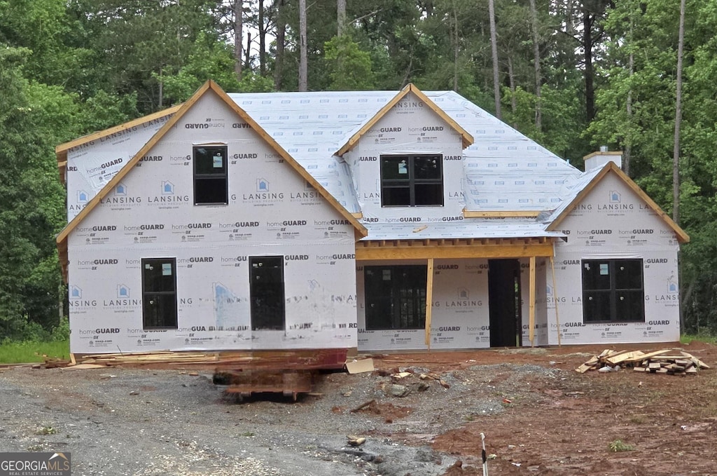2039 Fischer Rd, Sharpsburg, GA 30277 - unfinished property with a chimney