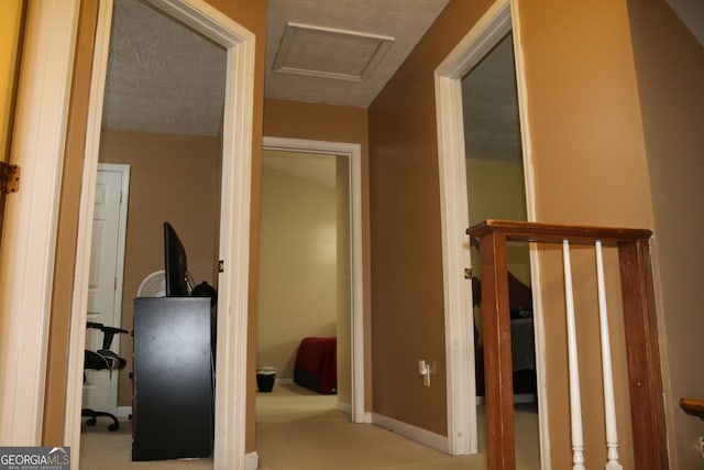 3255 Hunters Crossing Pt, Lithonia, GA 30038 - hallway with carpet flooring, baseboards, and attic access
