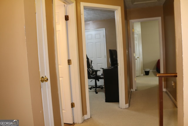 3255 Hunters Crossing Pt, Lithonia, GA 30038 - corridor featuring light colored carpet, an office area, and baseboards