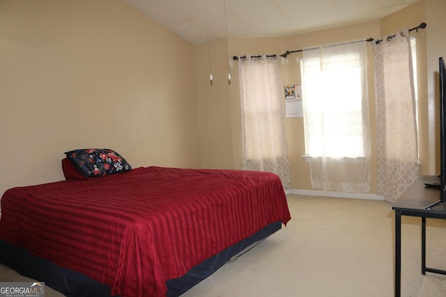 3255 Hunters Crossing Pt, Lithonia, GA 30038 - carpeted bedroom with baseboards