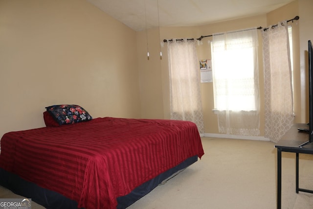 3255 Hunters Crossing Pt, Lithonia, GA 30038 - carpeted bedroom featuring baseboards