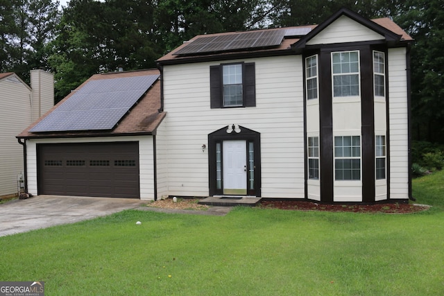3255 Hunters Crossing Pt, Lithonia, GA 30038 - view of front of home featuring solar panels, concrete driveway, an attached garage, and a front yard