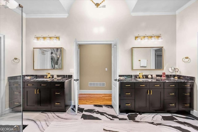 4670 Hamden Forest Dr SW, Atlanta, GA 30331 - bathroom featuring ornamental molding and two vanities