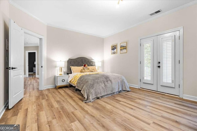 4670 Hamden Forest Dr SW, Atlanta, GA 30331 - bedroom featuring crown molding, light wood finished floors, and access to exterior