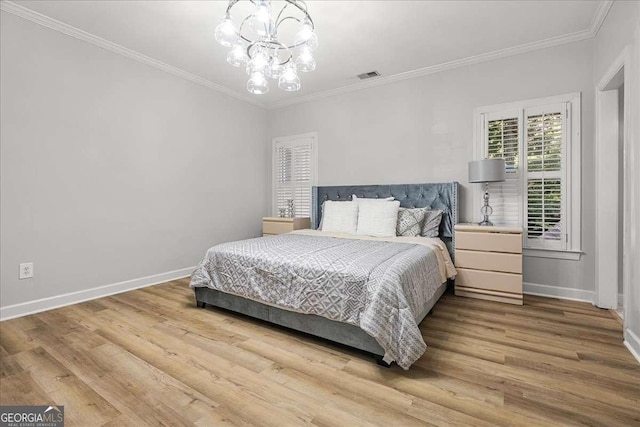 4670 Hamden Forest Dr SW, Atlanta, GA 30331 - bedroom featuring ornamental molding, wood finished floors, and a chandelier