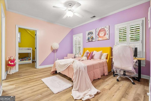 4670 Hamden Forest Dr SW, Atlanta, GA 30331 - bedroom featuring ornamental molding, wood finished floors, and a ceiling fan