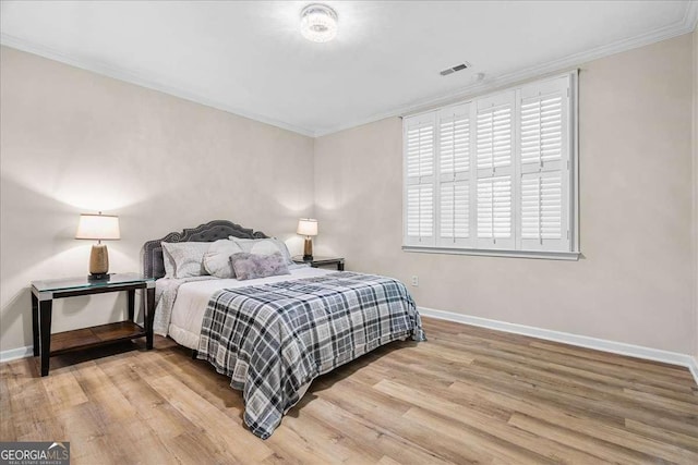 4670 Hamden Forest Dr SW, Atlanta, GA 30331 - bedroom featuring crown molding and wood finished floors