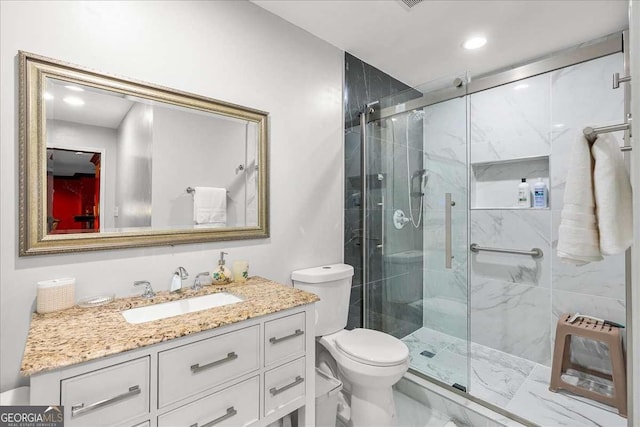 4670 Hamden Forest Dr SW, Atlanta, GA 30331 - full bath featuring a marble finish shower, vanity, marble look tile flooring, and recessed lighting