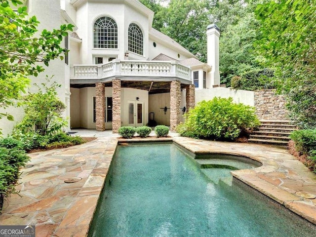 4670 Hamden Forest Dr SW, Atlanta, GA 30331 - back of house with french doors, stucco siding, a balcony, and a patio area
