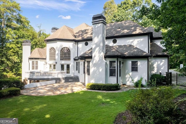 4670 Hamden Forest Dr SW, Atlanta, GA 30331 - rear view of property featuring french doors, a chimney, stucco siding, and a patio
