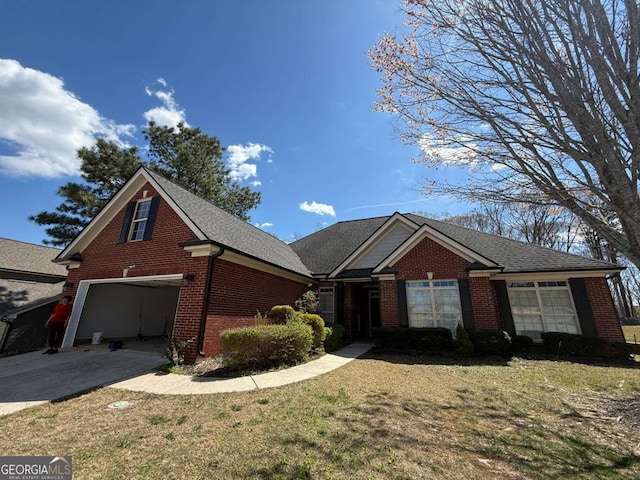 2728 Limestone, Gainesville, GA 30501 - view of front of home with brick siding, driveway, a front yard, and an attached garage