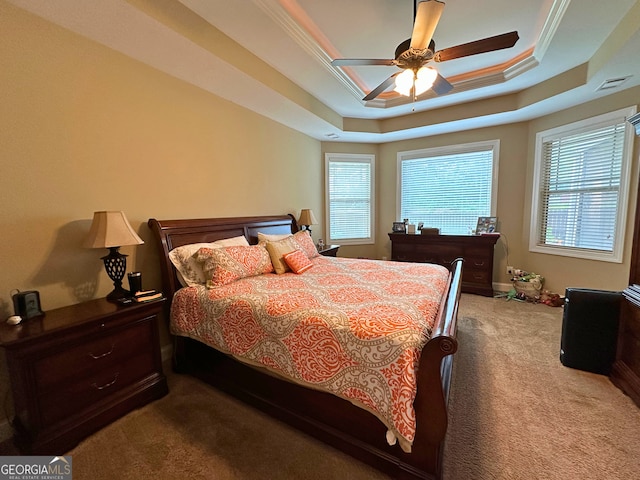 307 Legacy Park Dr, Perry, GA 31069 - bedroom featuring carpet, a raised ceiling, multiple windows, and ornamental molding