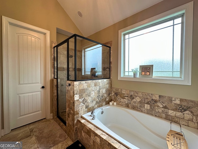 307 Legacy Park Dr, Perry, GA 31069 - bathroom with a garden tub, a shower stall, and vaulted ceiling