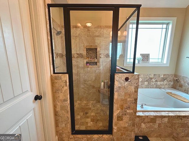 307 Legacy Park Dr, Perry, GA 31069 - full bath with a garden tub and a stall shower