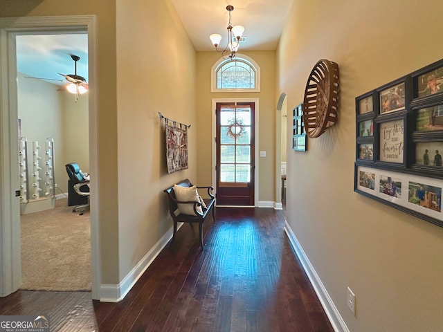 307 Legacy Park Dr, Perry, GA 31069 - foyer entrance with hardwood / wood-style flooring, arched walkways, a chandelier, and ceiling fan