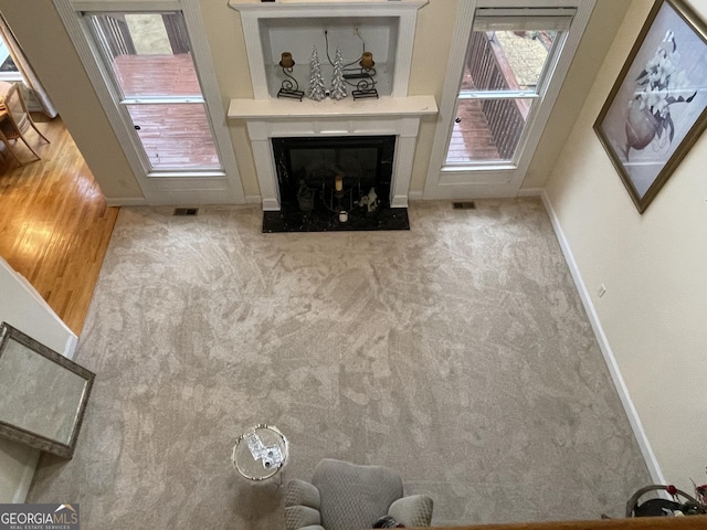 2123 Floral Ridge Dr, Dacula, GA 30019 - unfurnished living room featuring a fireplace and carpet floors