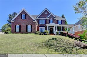 2123 Floral Ridge Dr, Dacula, GA 30019 - view of front of house featuring a front lawn