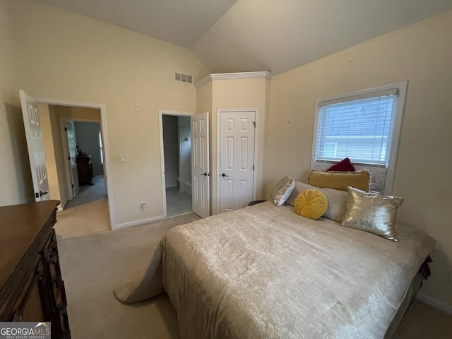 2123 Floral Ridge Dr, Dacula, GA 30019 - bedroom with light colored carpet and vaulted ceiling