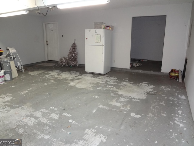 2958 Mary Alice Trl, Loganville, GA 30052 - garage with freestanding refrigerator