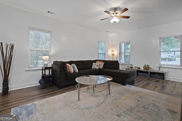 102 Brookstone Way, Rincon, GA 31326 - living room featuring wood finished floors, ceiling fan, and baseboards