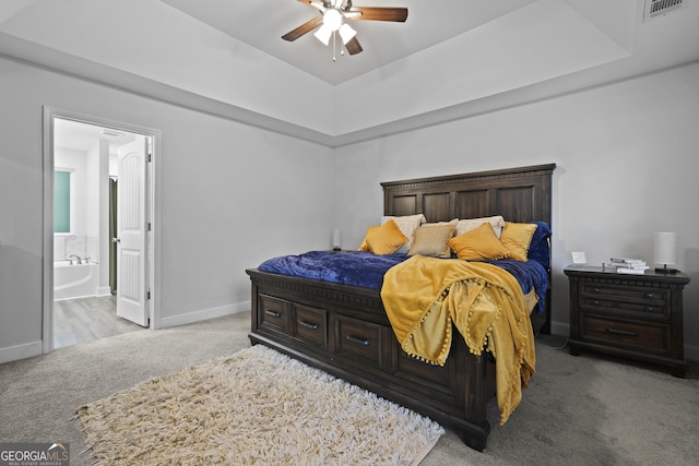102 Brookstone Way, Rincon, GA 31326 - bedroom with carpet, baseboards, ensuite bath, and ceiling fan