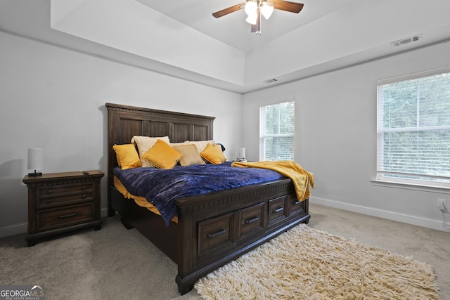 102 Brookstone Way, Rincon, GA 31326 - bedroom featuring carpet, baseboards, a tray ceiling, and a ceiling fan