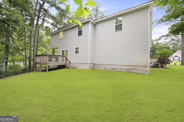 102 Brookstone Way, Rincon, GA 31326 - rear view of property with a deck, a yard, and central AC