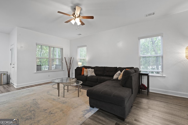 102 Brookstone Way, Rincon, GA 31326 - living room featuring healthy amount of natural light, wood finished floors, a ceiling fan, and baseboards