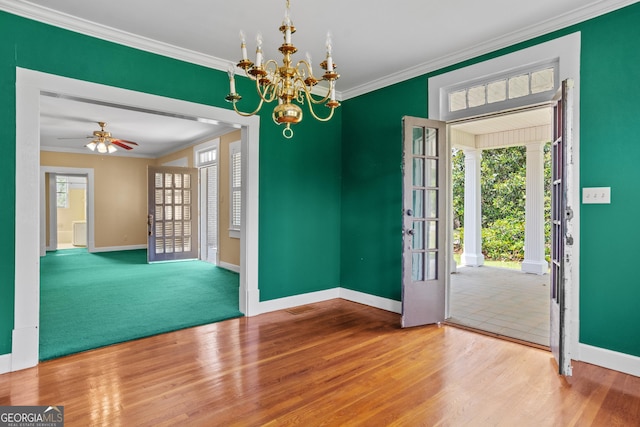7443 Church St, Bartow, GA 30413 - foyer featuring crown molding, baseboards, wood finished floors, a chandelier, and a ceiling fan