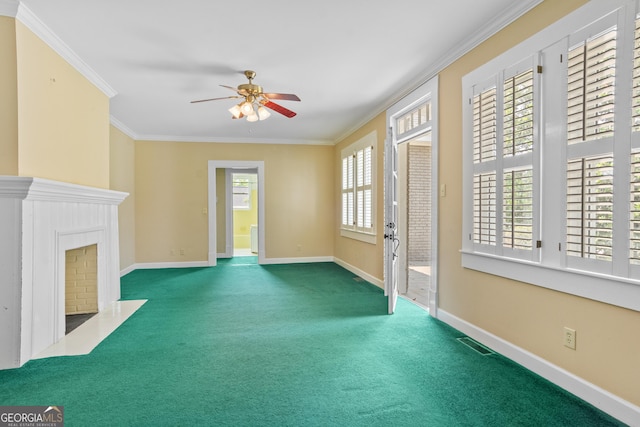 7443 Church St, Bartow, GA 30413 - unfurnished living room with a fireplace with flush hearth, a ceiling fan, crown molding, baseboards, and carpet floors