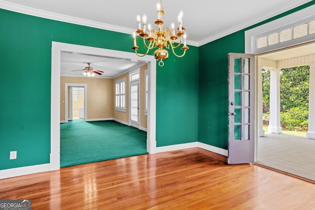 7443 Church St, Bartow, GA 30413 - entrance foyer with baseboards, ornamental molding, wood finished floors, and a chandelier