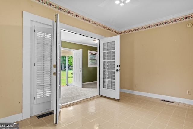 7443 Church St, Bartow, GA 30413 - entryway with ceiling fan, ornamental molding, and baseboards