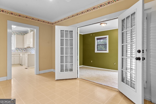7443 Church St, Bartow, GA 30413 - unfurnished room with crown molding, baseboards, and light floors