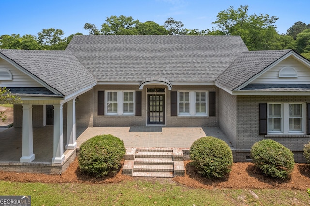 7443 Church St, Bartow, GA 30413 - view of front of house featuring brick siding and a shingled roof
