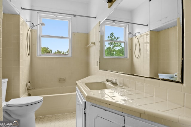 7443 Church St, Bartow, GA 30413 - bathroom featuring toilet, vanity, bathtub / shower combination, and tile patterned floors