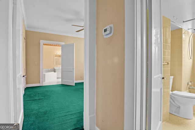 7443 Church St, Bartow, GA 30413 - bathroom with crown molding, ceiling fan, toilet, baseboards, and a shower