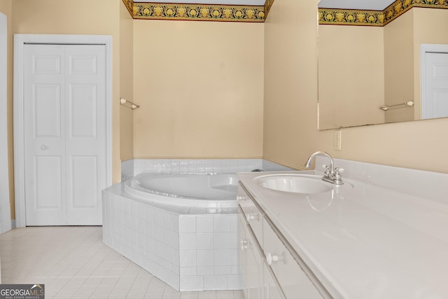 7443 Church St, Bartow, GA 30413 - full bath featuring vanity, a garden tub, and tile patterned flooring