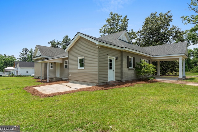 7443 Church St, Bartow, GA 30413 - view of front facade featuring a front lawn and a shingled roof