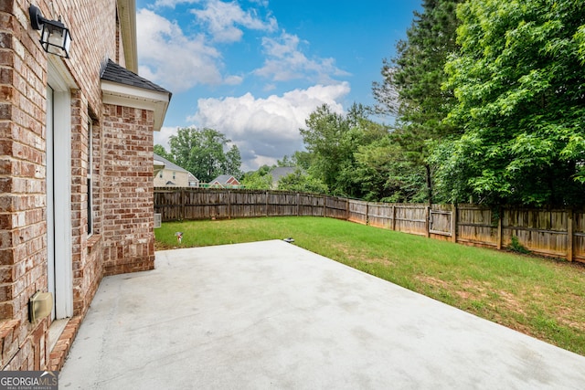 1076 Scenic Park Trl, Lawrenceville, GA 30046 - fenced backyard with a patio