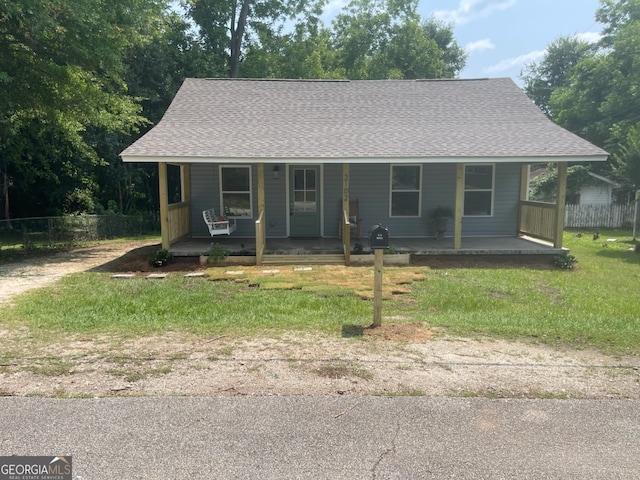2102 53rd St, Valley, AL 36854 - farmhouse featuring covered porch and roof with shingles