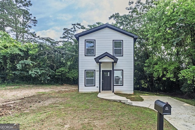 2065 Freeman St, Macon, GA 31201 - traditional-style home featuring a front lawn
